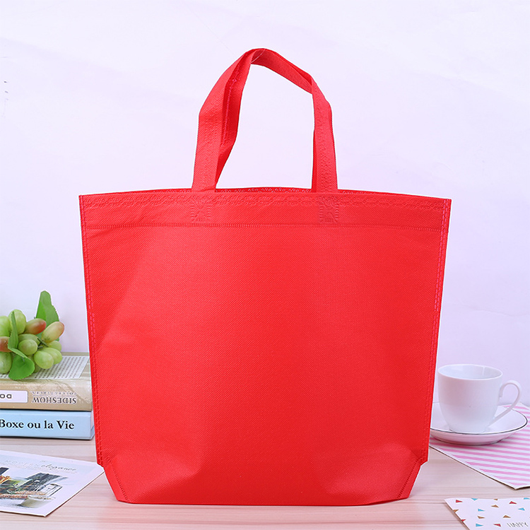 Wholesale printed logo eco friendly non-woven tote bag reusable non woven grocery shopping bags with handles