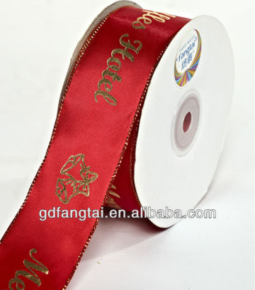 golden stamped ribbon with logo