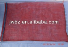 Plastic netting sacks for firewood