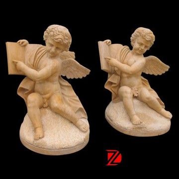 Male angel figurines