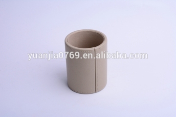 light brwon leather round tube table pen stand