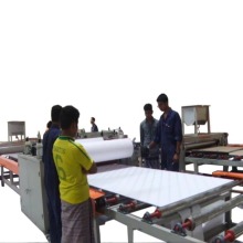 Gypsum board lamination machine