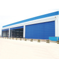 Fast action high speed rolling up hangar door