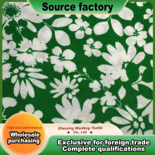 Green base with large floral print