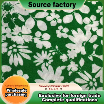 Green base with large floral print