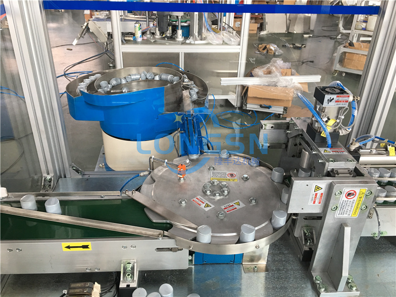 Automatic plastic cap insert assembly machine