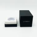 Zwarte textuur papieren doos voor parfumfles