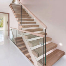Round Glass Cantilevered Interior Staircase