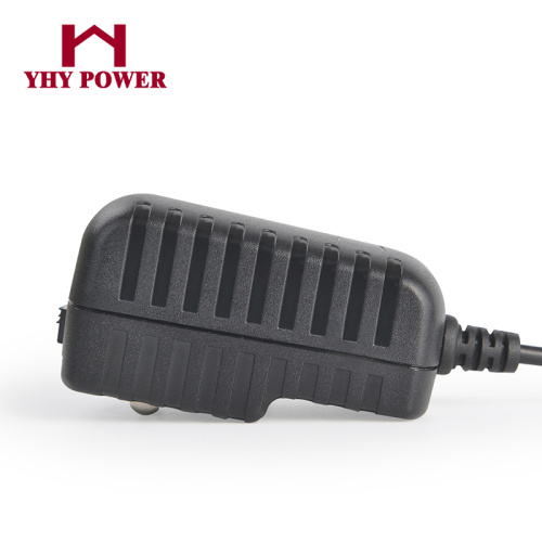 Interchangeable plug 9v 1a Power Adapter