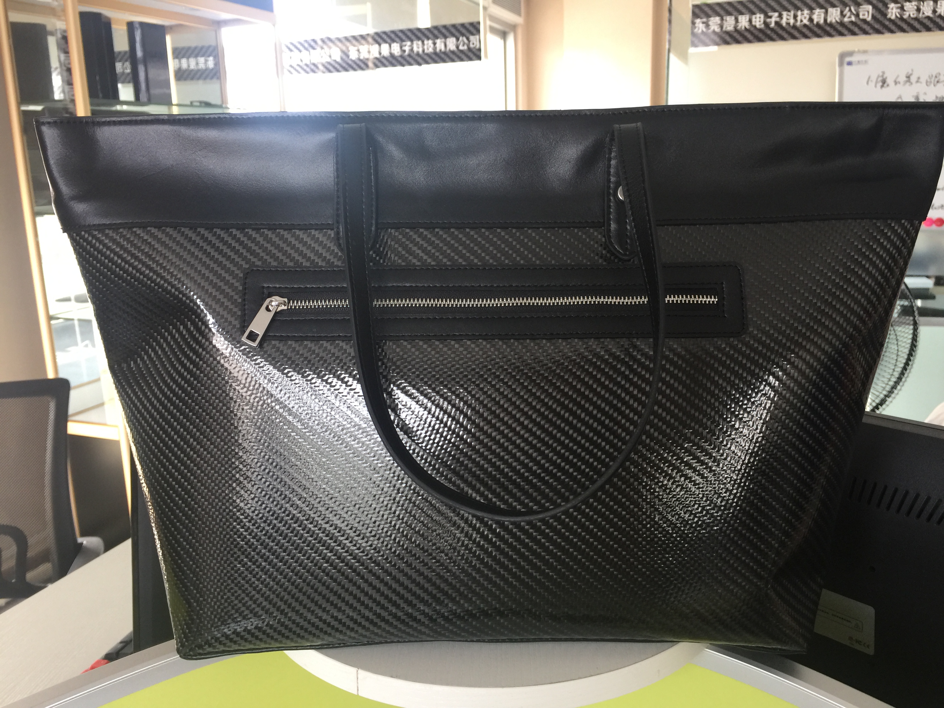 new carbon handbag