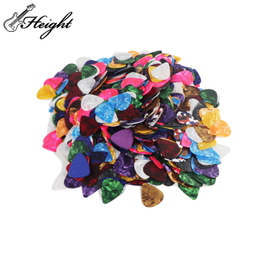 Custom Guitar Picks and Pick Guards for Acoustic and Electric Guitars