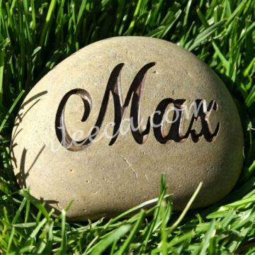 Decorative carved pebbles with words