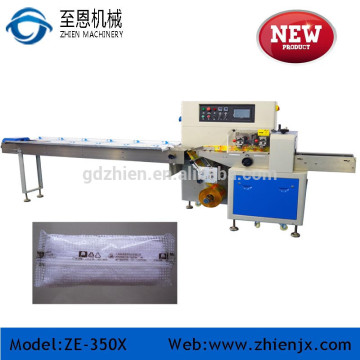 horizontal flow hotel towel wrapping machine