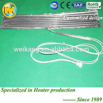 Defrost tray heater for refrigerator