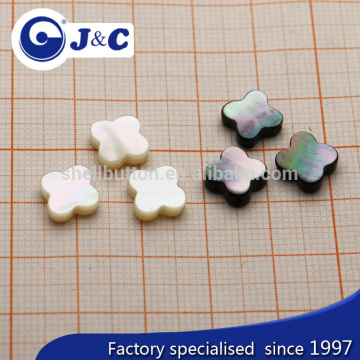 black MOP and white mother of shell flower beads