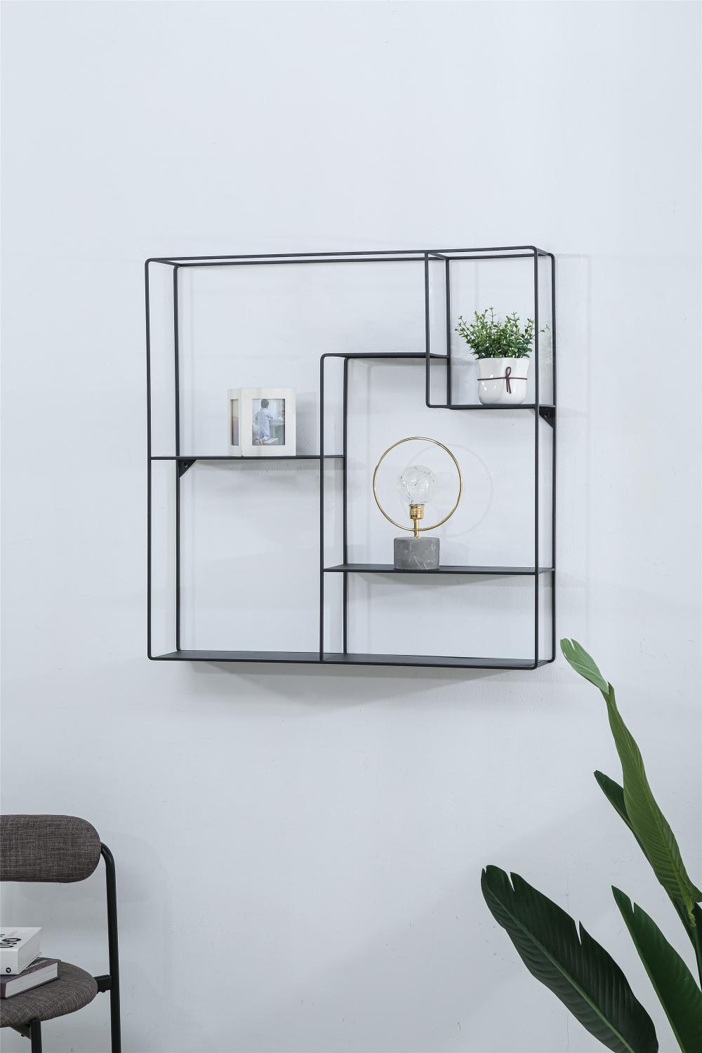 Metal wall-mounted shelf for interior decoration