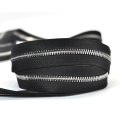 Long chain titanium metal zipper roll