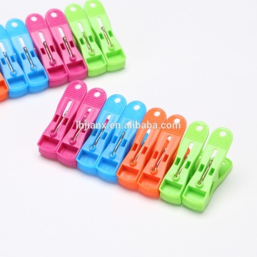 clip; clothespin spring; plastic clip