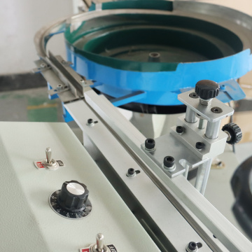 Bulk vertical lead cutting machine