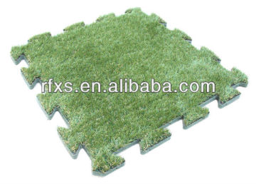 Interlocking artificial grass tile