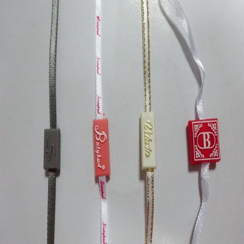 Plastic tags with cotton cord