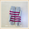 women knitted stripped mittens