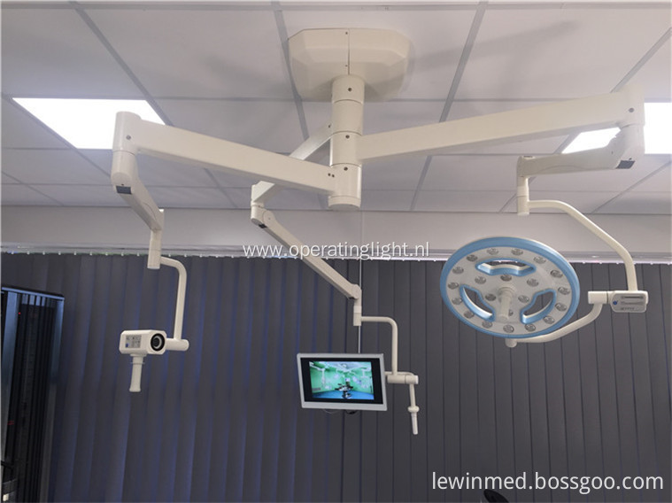 Surgical hollow lamp with camera system