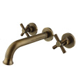 Double handle hot and cold wall-mounted basin faucet