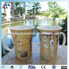 Ceramic mug cup with fake gold coffee to go cup