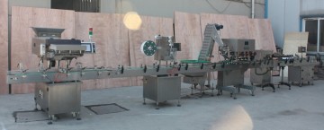 Economical high performance tablet packing line