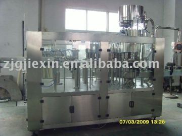 Washing filling and screw capping monobloc machine