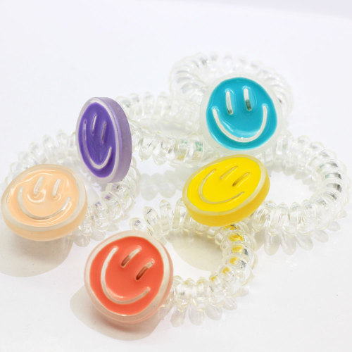 Nuevo Kawaii Clear Phone Cord Hair Ties con Smile Face Coil Cable de teléfono Cuerda de pelo Soporte de cola de caballo Envoltura de coleta