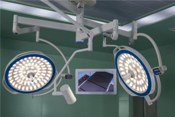 Dual lamp head led light with camera system