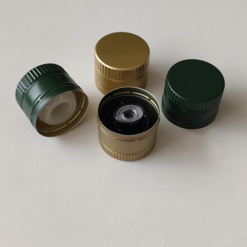 Olive oil bottle closures with plastic fitments