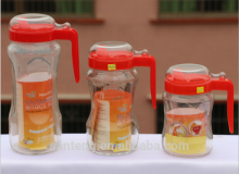 Glass oill bottle with candle and lid