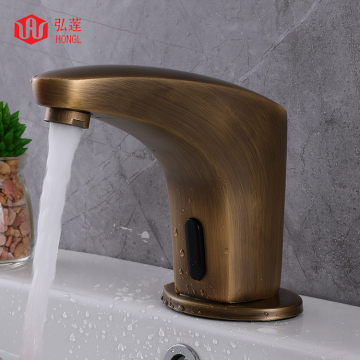 Countertop mounted sensor touches bathroom sink faucet