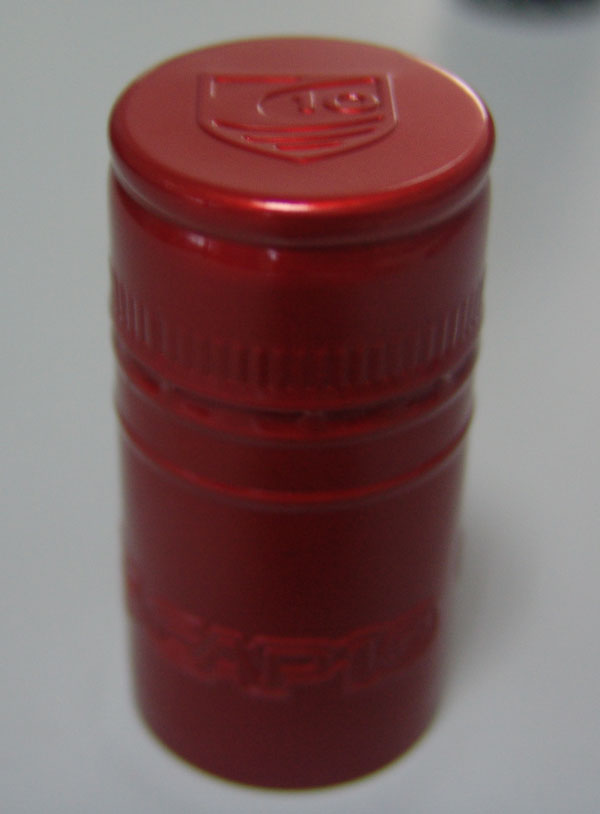 Embossed printed screwcaps seasoning