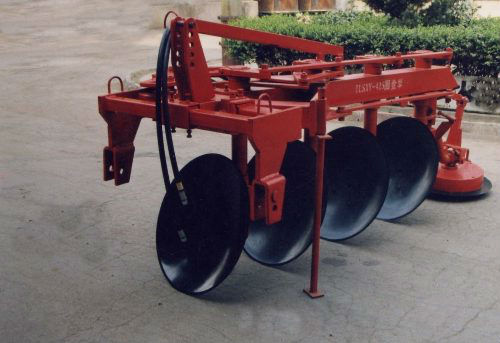 Hydraulic reversible disc plough