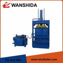 Vertical baler for paper plastic and cardboard