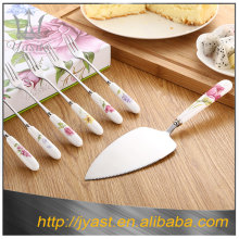 Stainless steel fork and pizza shovel with porcelain handle