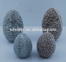 egg shape candle with lace pattern