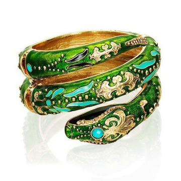 Fancy green curving snake bangles