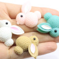 100 stks Slime Charm Kralen Hars Cabochon Plaksteen Konijn Bunny Miniatuur Beeldjes voor DIY Telefoon Geval Haar Boog Decoratie