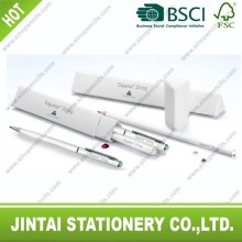 White ballpoint pen pen end with crystal in a white triangle tube