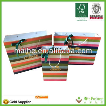 garments shopping coated paper bag