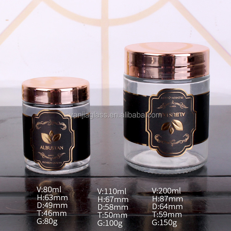 cheap cylinder 200ml glass jar with customized logo round glass jar with rose gold lid