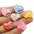 Fornitura di colori assortiti Resina Cuore adorabile Note di pianoforte Ciondoli posteriori piatti Cabochons artigianali fai-da-te per bambini Accessorio per album