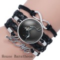 Pulsera de cuero trenzado con logo abovedada de cristal de Stark Wolf de Game of Thrones