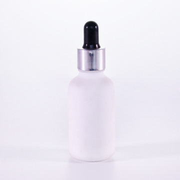 Frosted white glass oil bottle with silver dropper