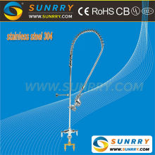 High pressure stainless steel elcetric water heater faucet installed on the sink